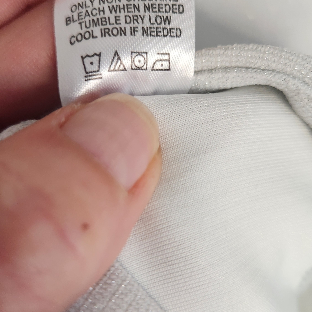 Badgley Mischka White Top with Subtle Metallic Trim - Picture 5 of 9